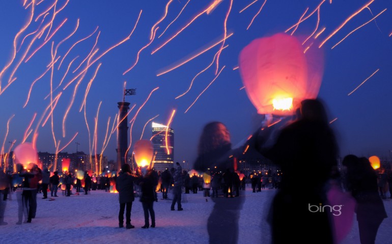 Long-exposure photograph of people launching paper lanterns on International Women's Day, St. Petersburg, Russia